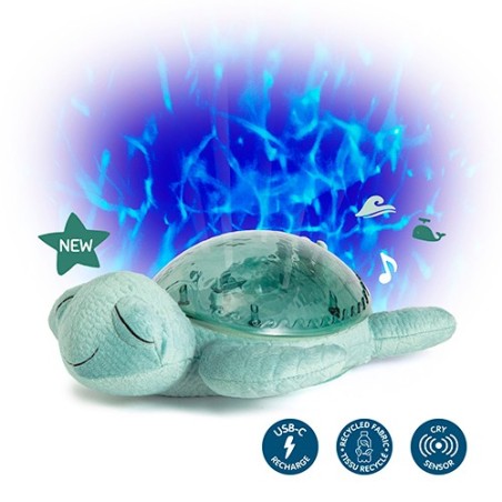 Peluche proyector Tranquil Turtle Verde recargable proyectando olas marinas azules en el techo con iconos de sensor de llanto
