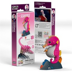 Caja y figura montada de un caballito de mar en 3D color rosa fucsia con un bebé naranja en la barriga, de cartón reciclado Eugy